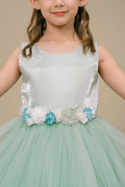 Visible on this Sage flower girl dress: dimensional flowers decorating the satin waist.