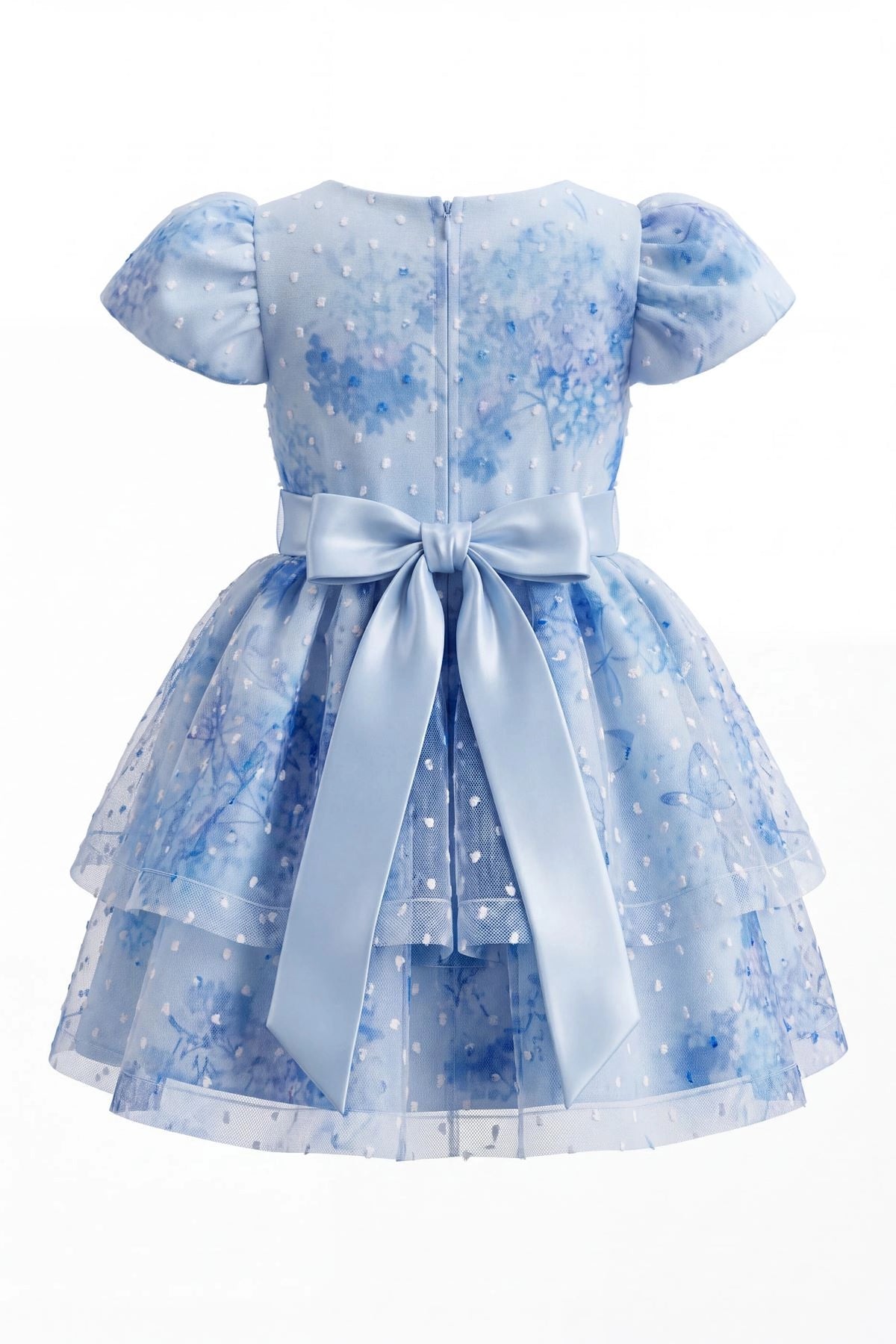 Tied at the back, the Blue kids dress features a large bow.