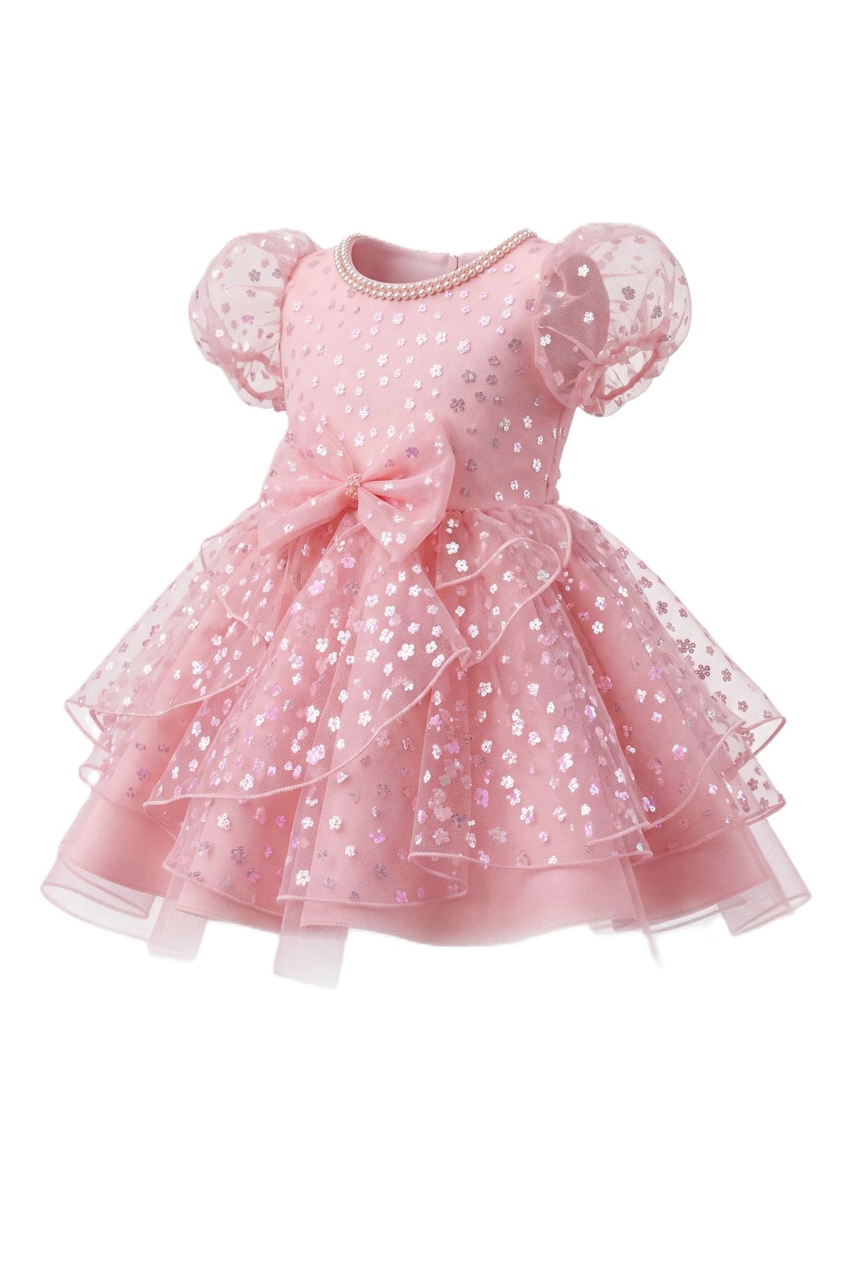 Layered shaping highlights a pearl-trimmed neckline on the Blush kids dress.