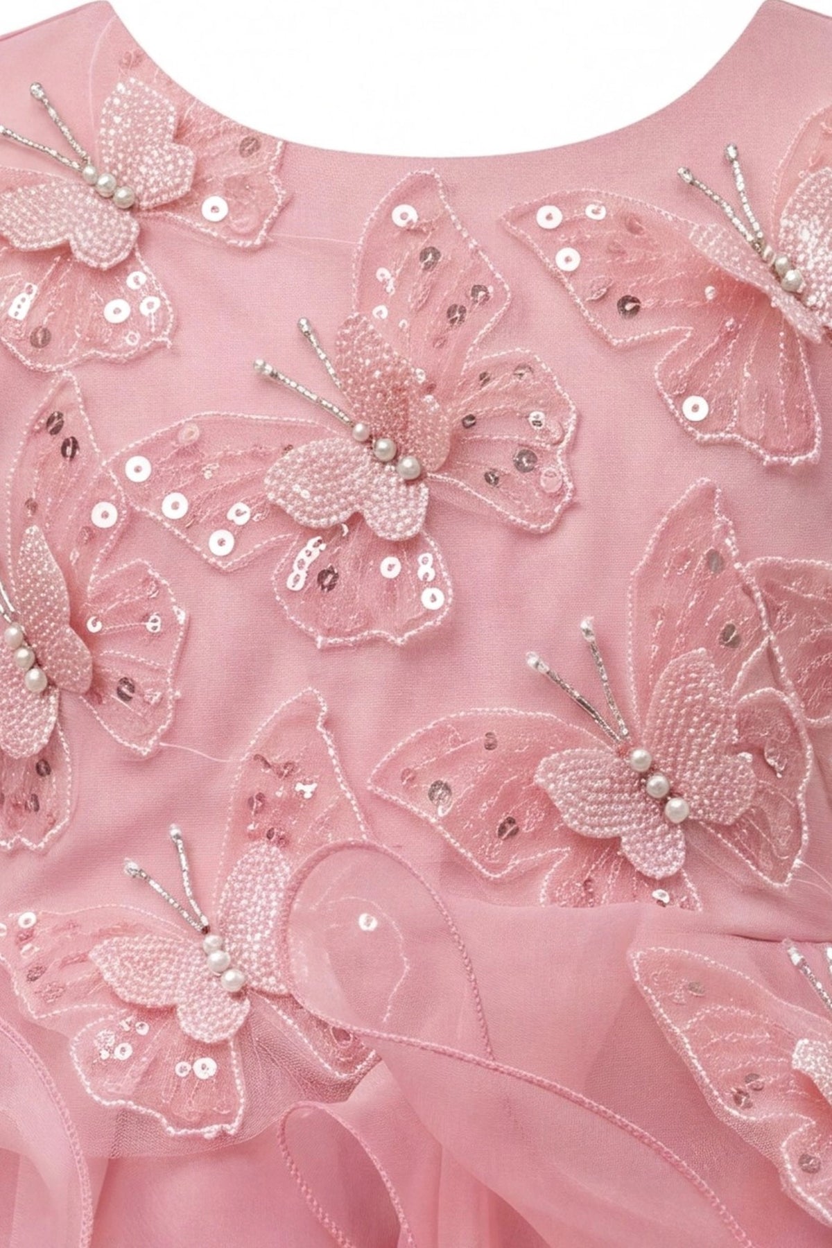 Detailed a ruffled full skirt complements the Rose kids dress.