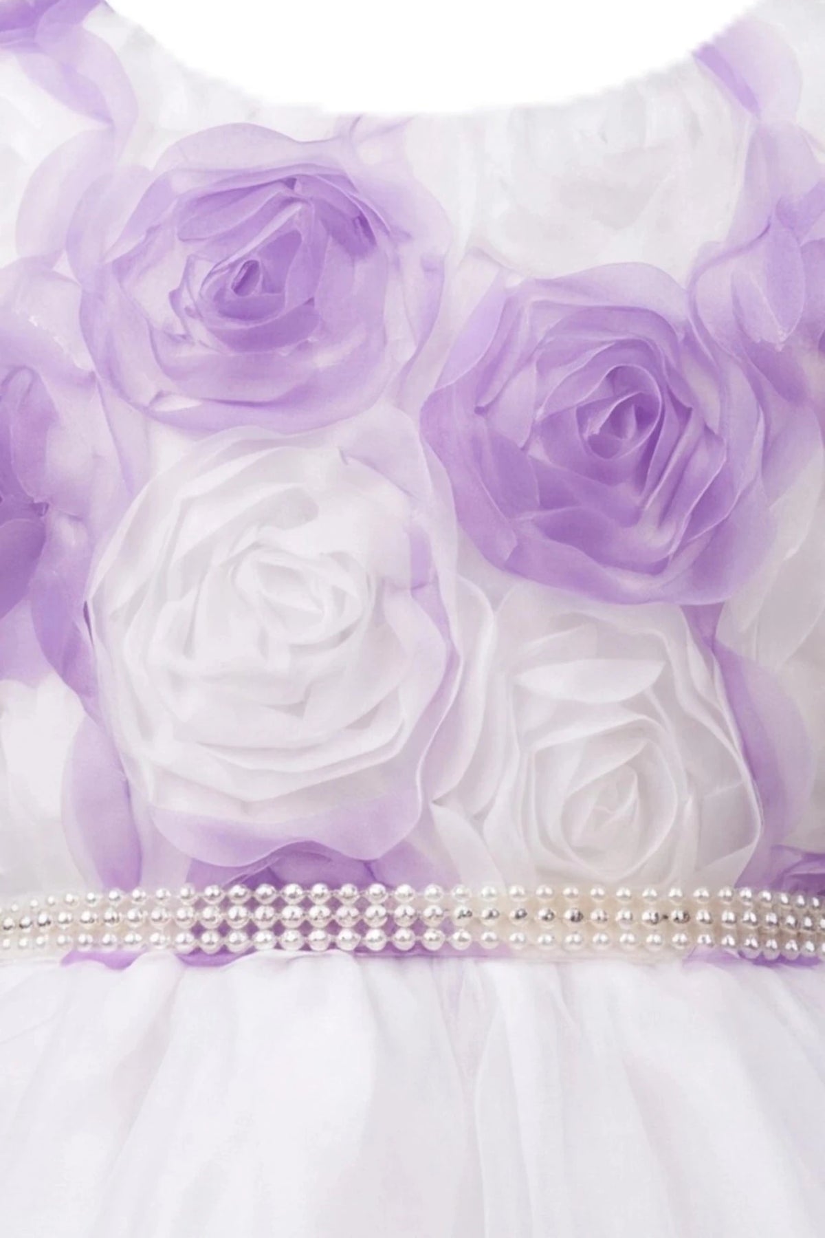 Detailed a pearl-trimmed waist complements the Lilac kids dress.