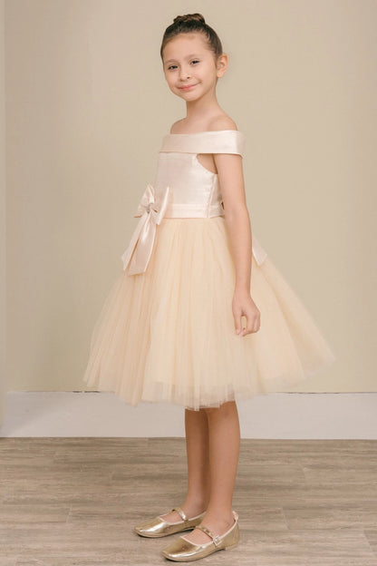 Featuring off-shoulder bodice and flared tulle hem on the Champagne flower girl dress.