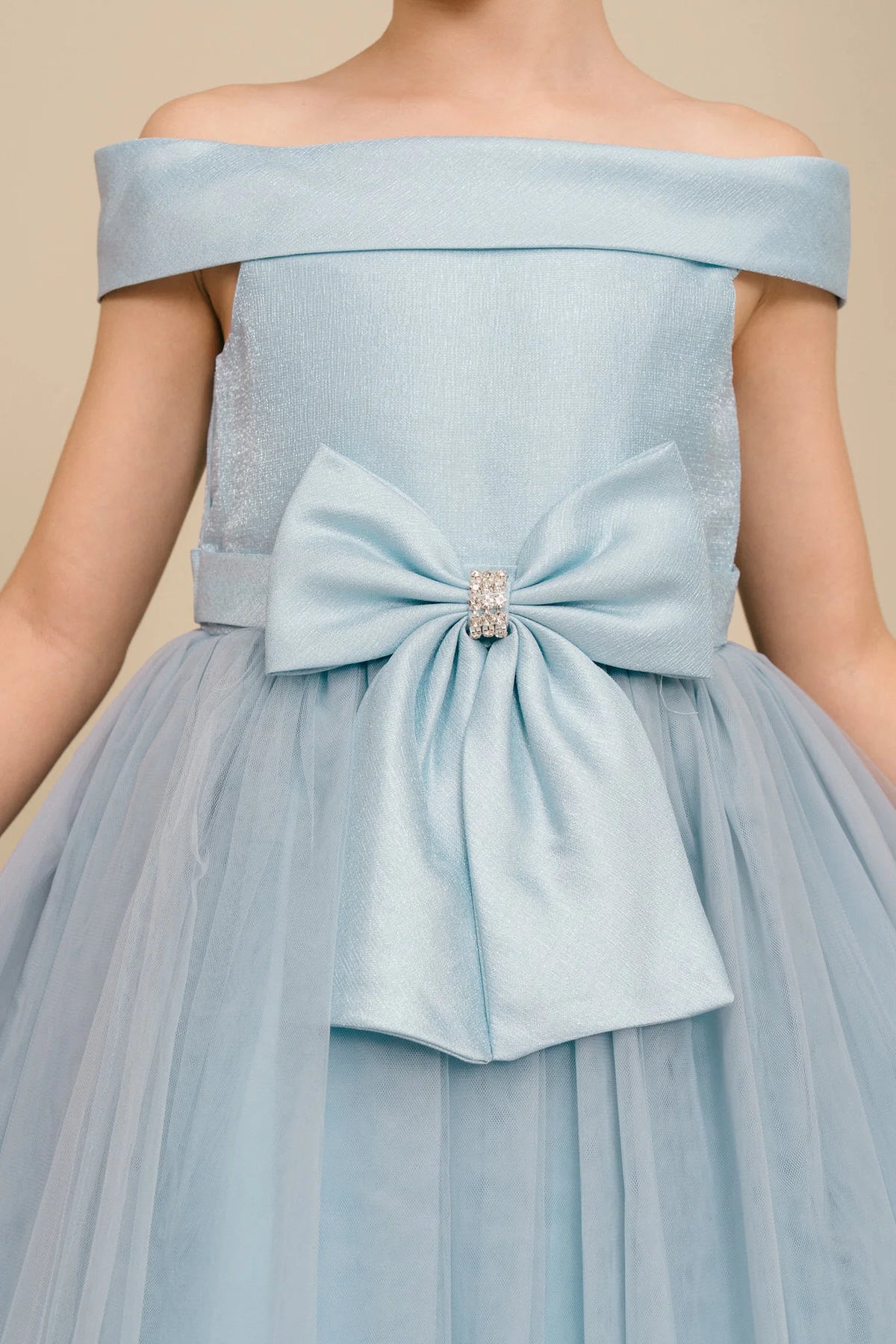 Visible on this Dusty Blue flower girl dress: large front bow with a jeweled accent.