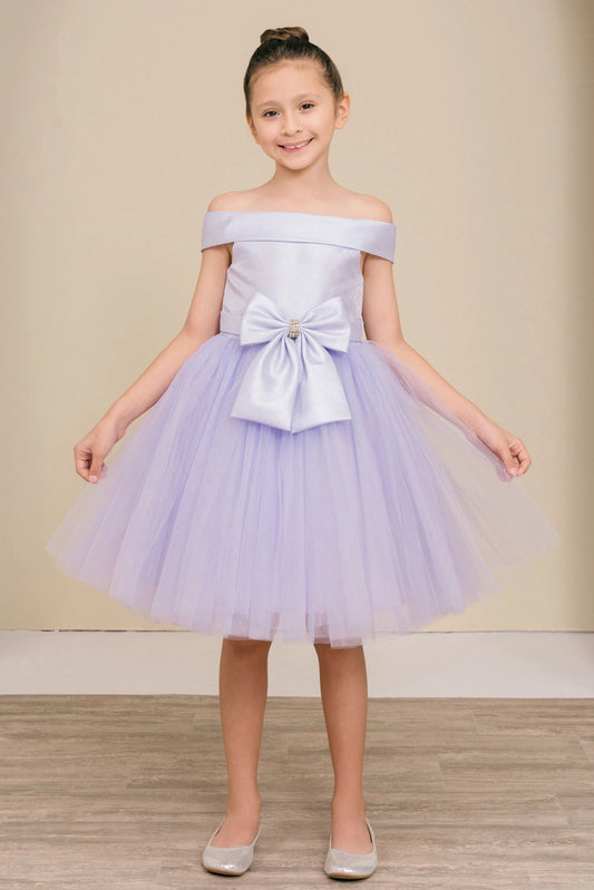 Lilac flower girl dress features off-shoulder satin bodice above the tulle skirt.