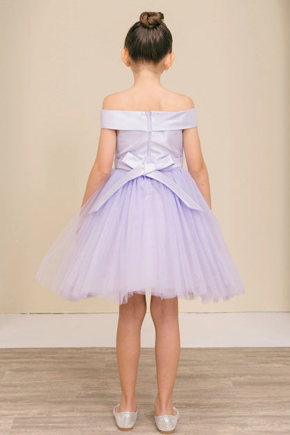 A Lilac flower girl dress showing satin bow and zipper at the back.