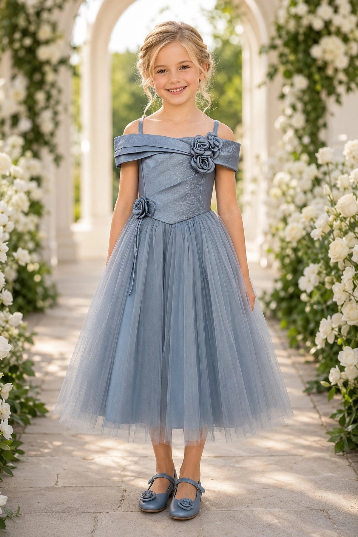 Showcasing rosette accents along the bodice, this Dusty Blue kids dress has a full skirt.