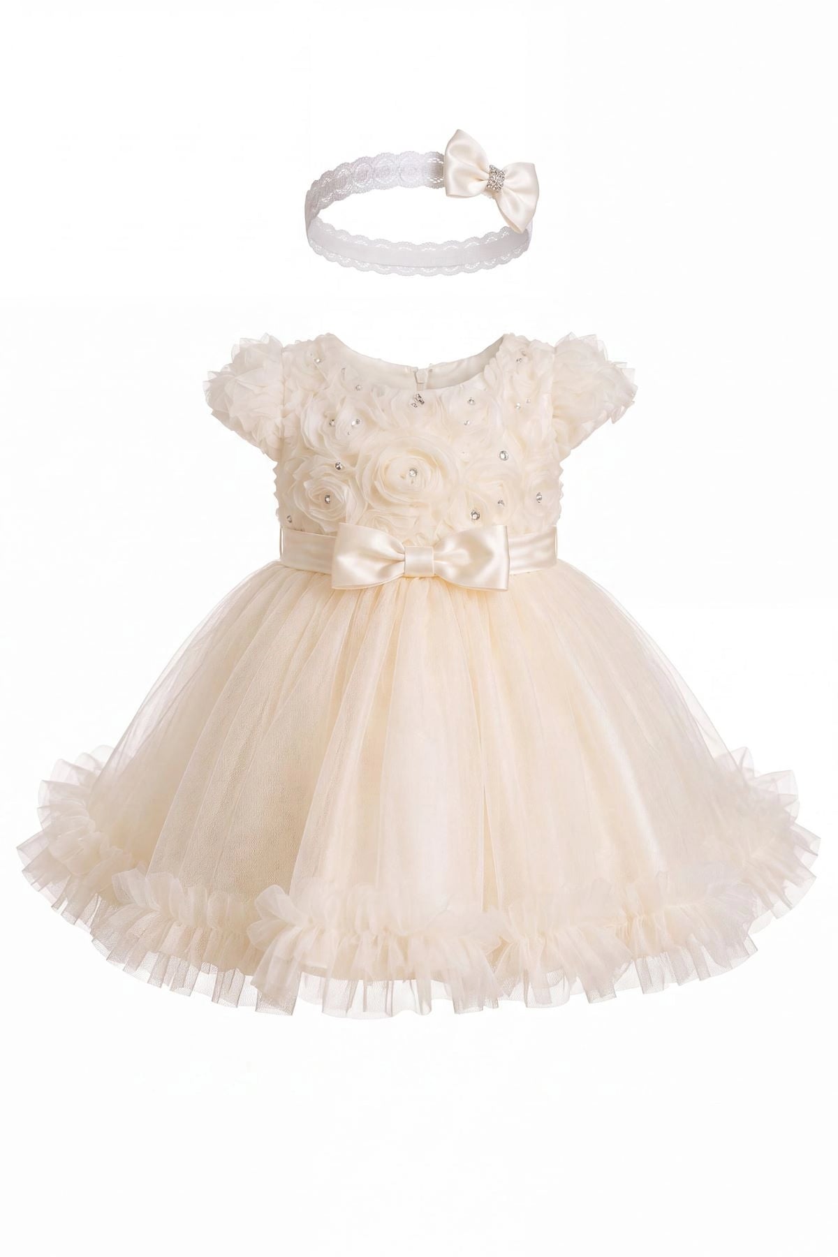 Layered shaping highlights rosette details across the bodice on the Champagne kids dress.
