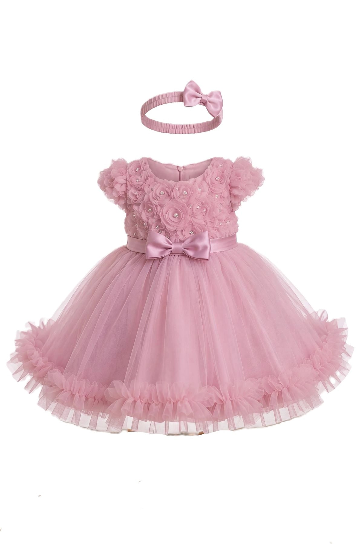 Layered shaping highlights rosette details across the bodice on the Dusty Rose kids dress.