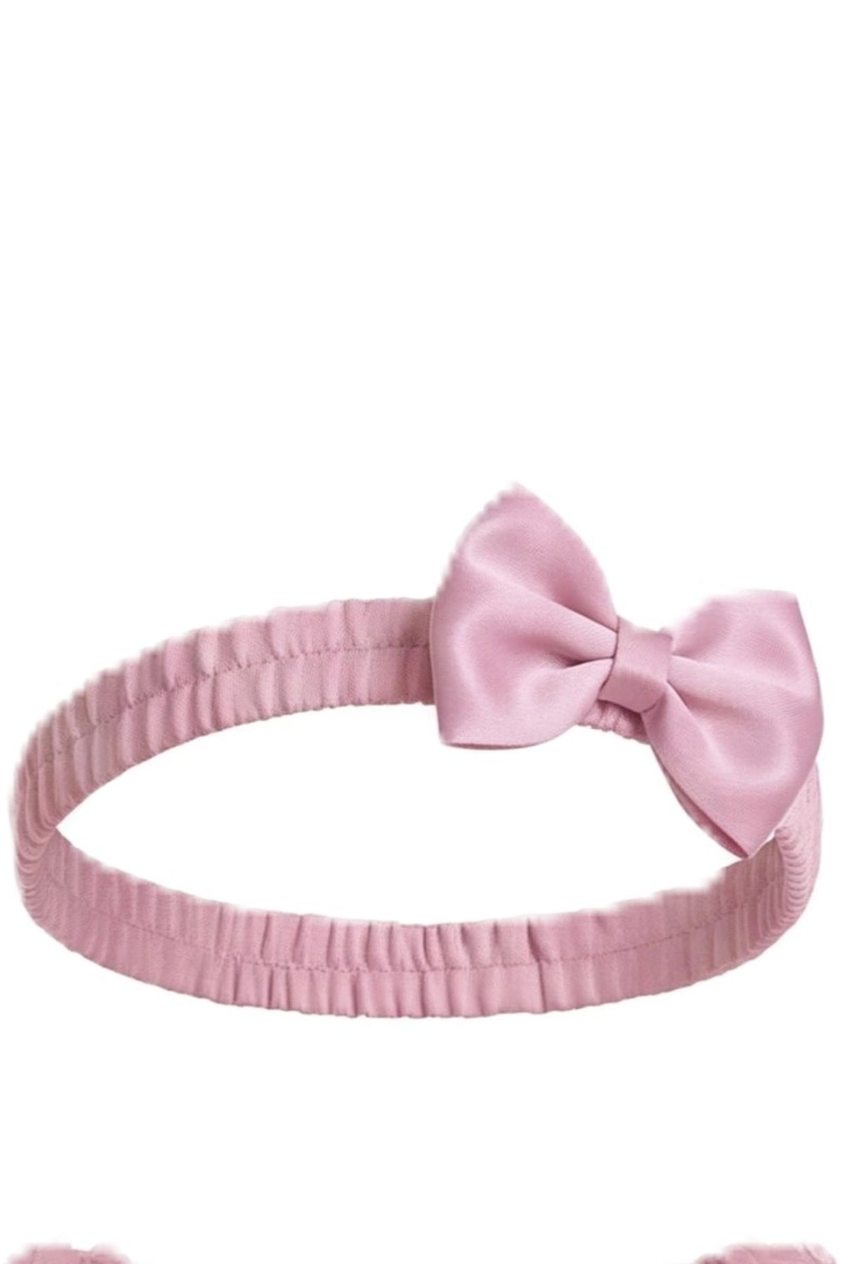 Matching bow headband accompanies the Dusty Rose kids dress with rosette details across the bodice.