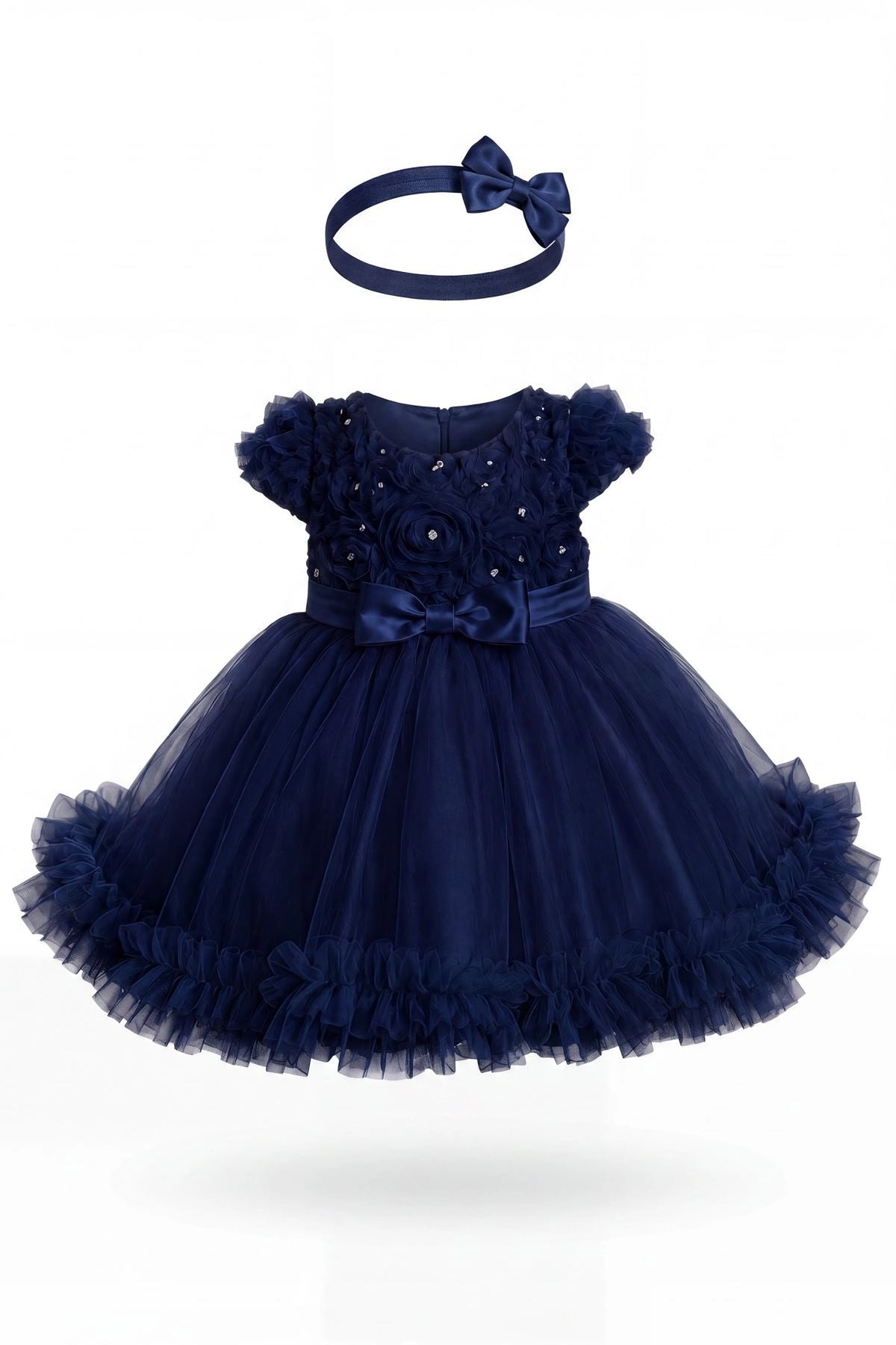 Layered shaping highlights rosette details across the bodice on the Navy kids dress.