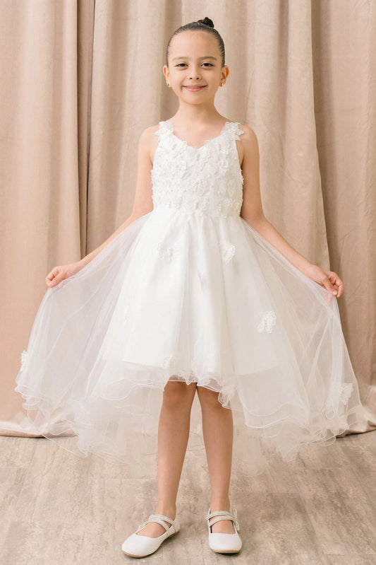 Accented three-dimensional bodice flowers adds character to this White kids party dress.