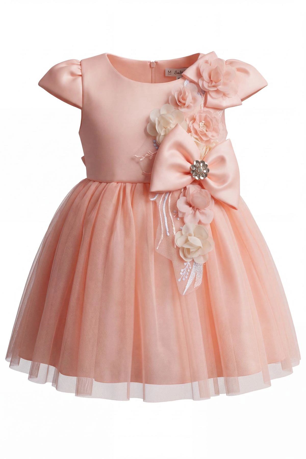 Layered shaping highlights flowers running down the front bodice on the Blush kids dress.