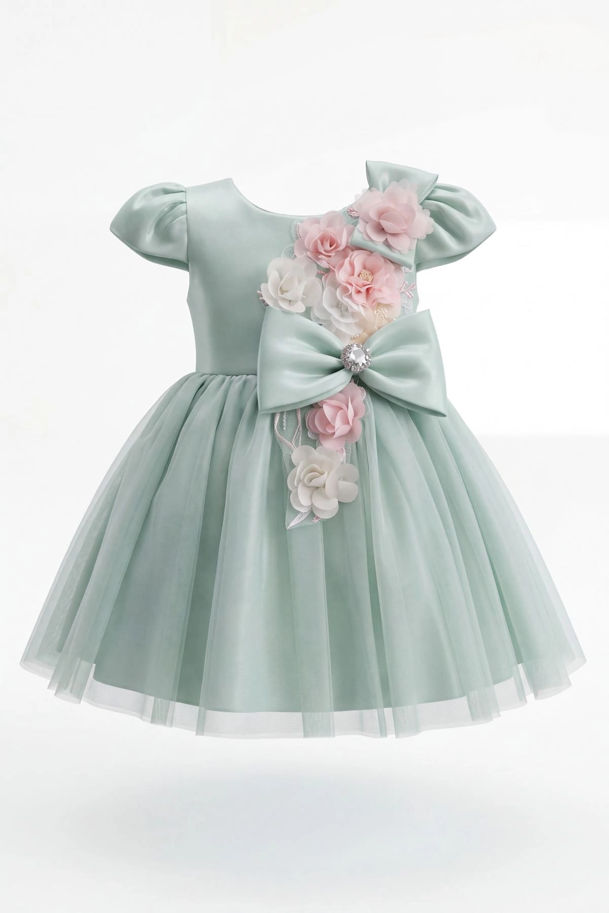 Layered shaping highlights flowers running down the front bodice on the Sage kids dress.