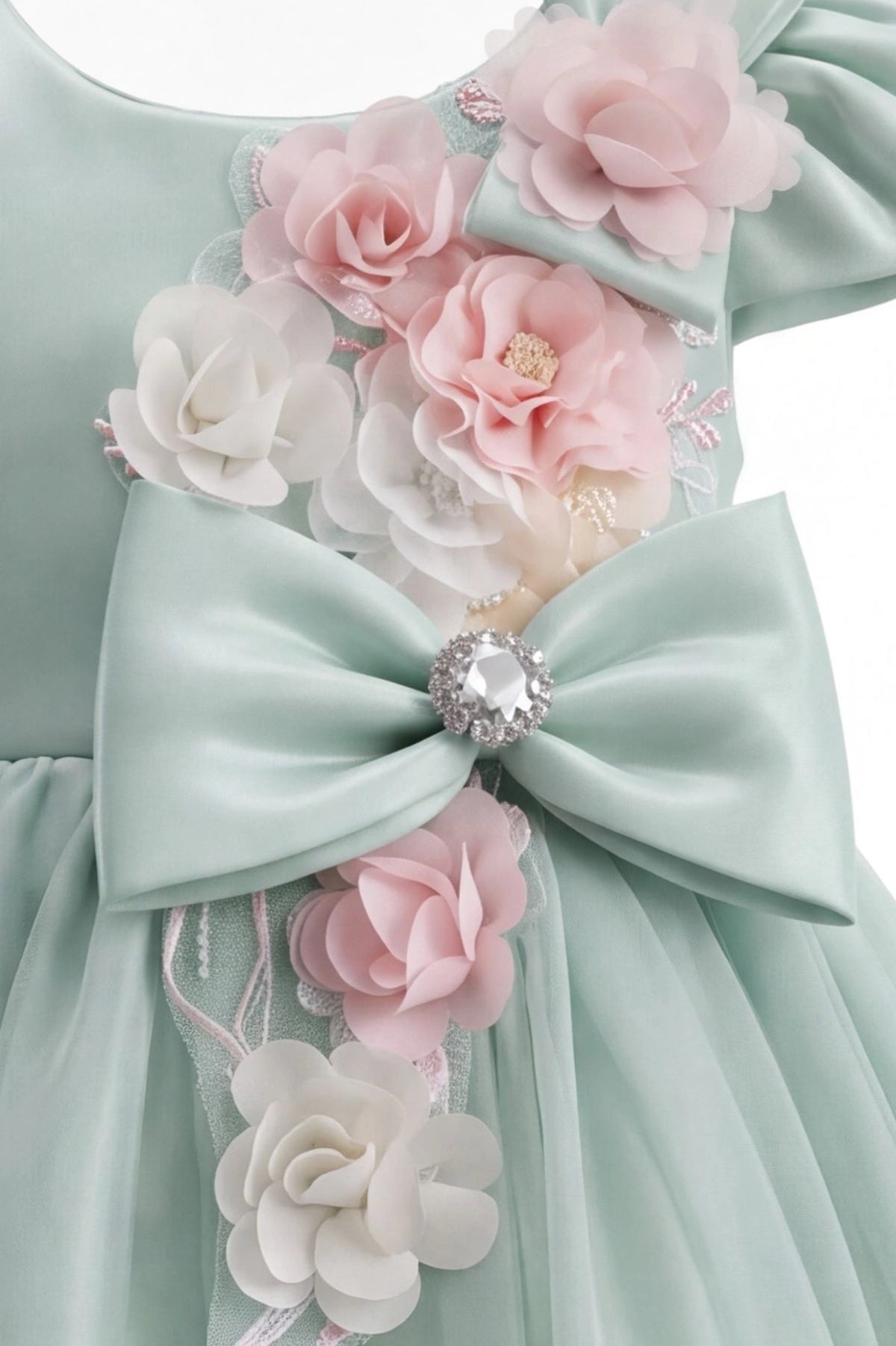 Detailed a jeweled bow at the waist complements the Sage kids dress.