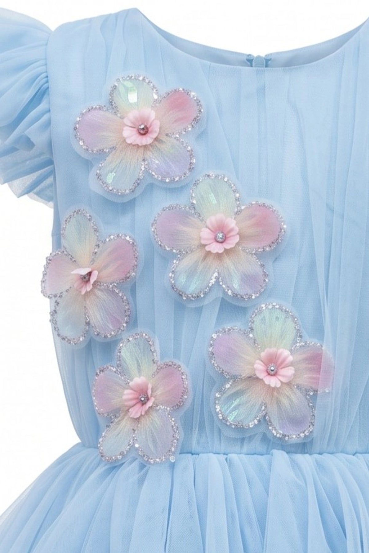 Detailed a tiered pearl-dotted skirt complements the Blue kids dress.