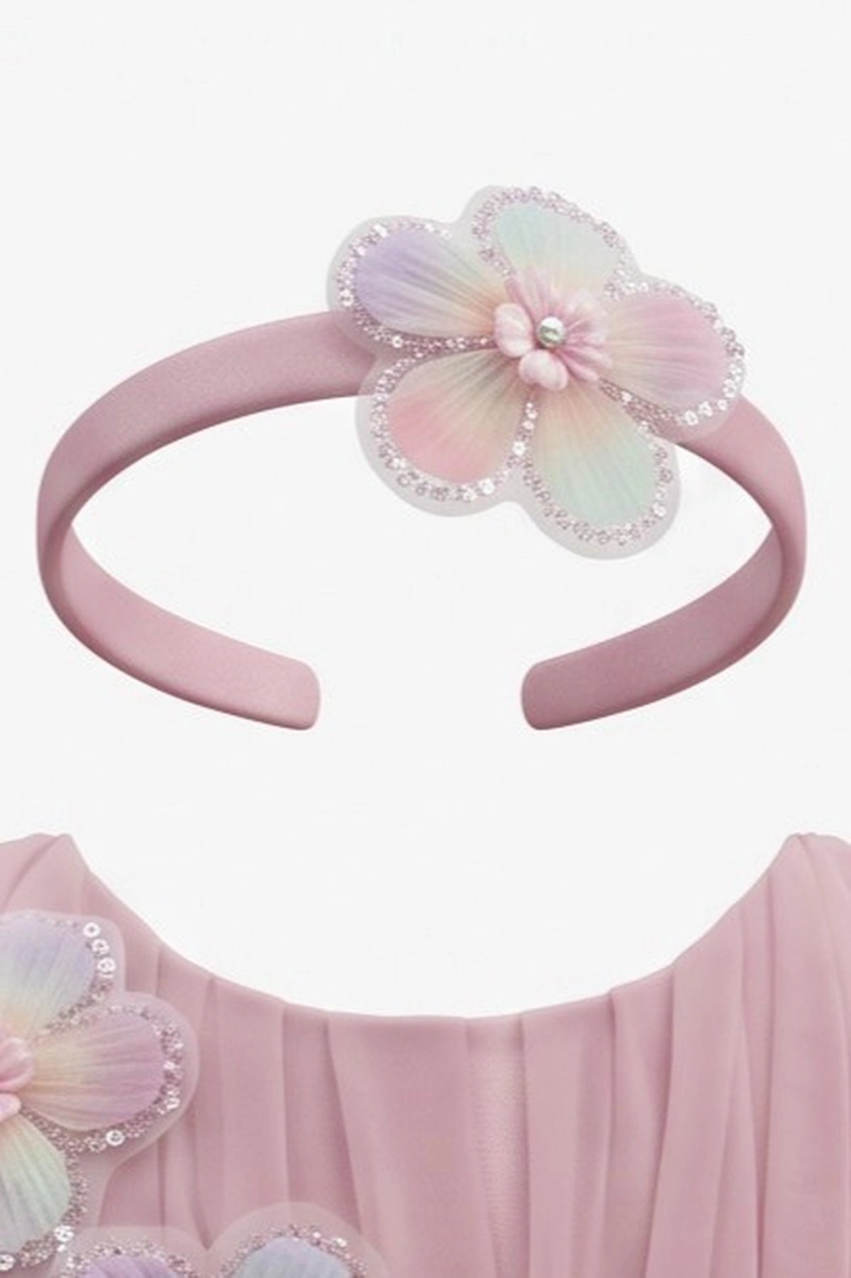 Matching bow headband accompanies the Rose kids dress with three-dimensional flower appliques.