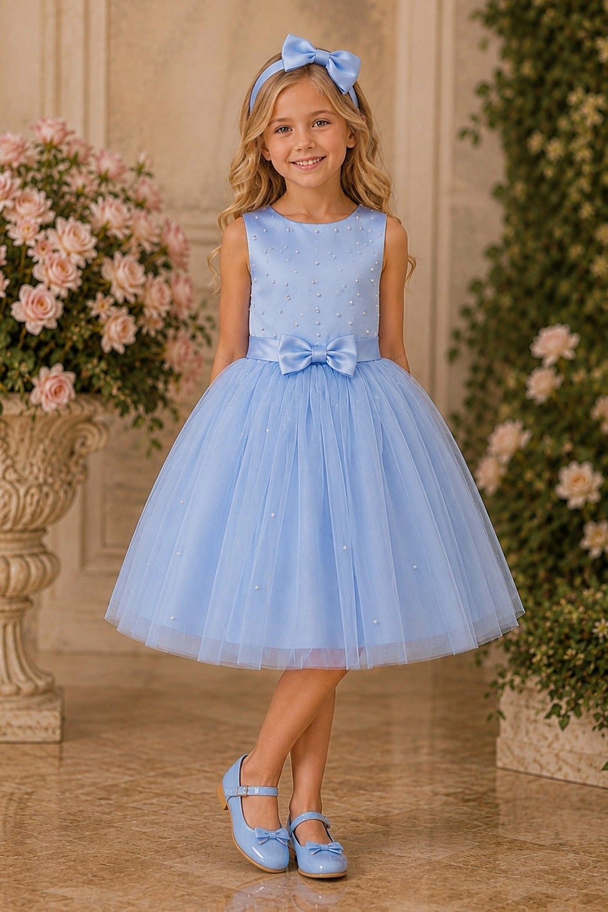 Showcasing pearl accents across the bodice, this Blue kids dress has a full skirt.