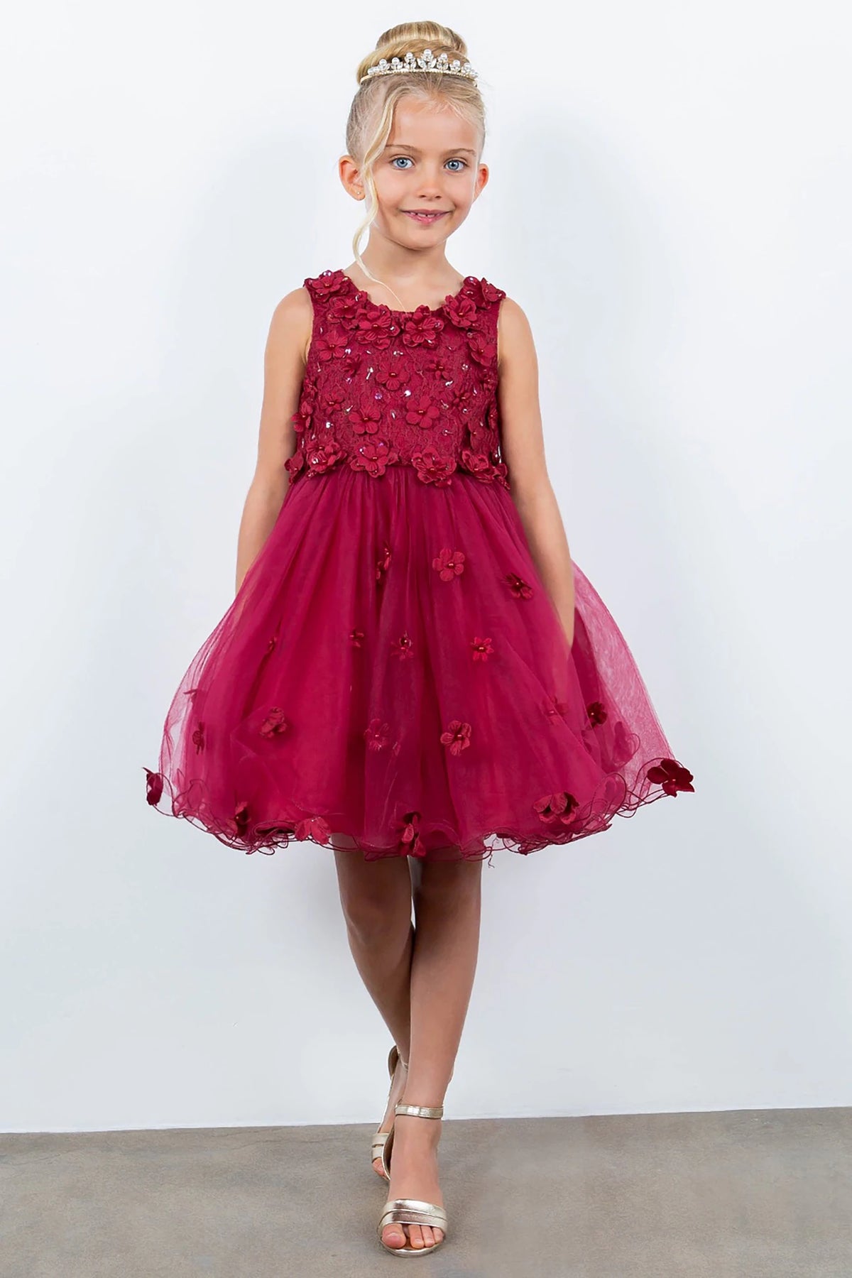 A burgundy floral flower girl dress.