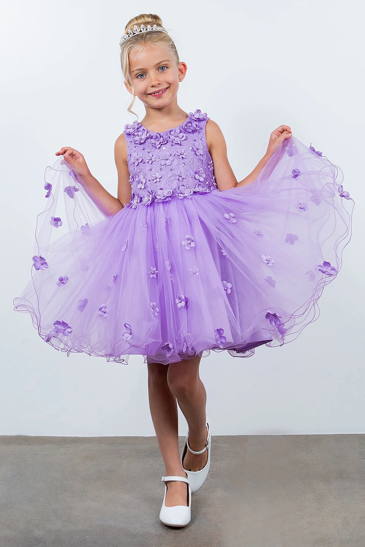 A lilac floral flower girl dress.