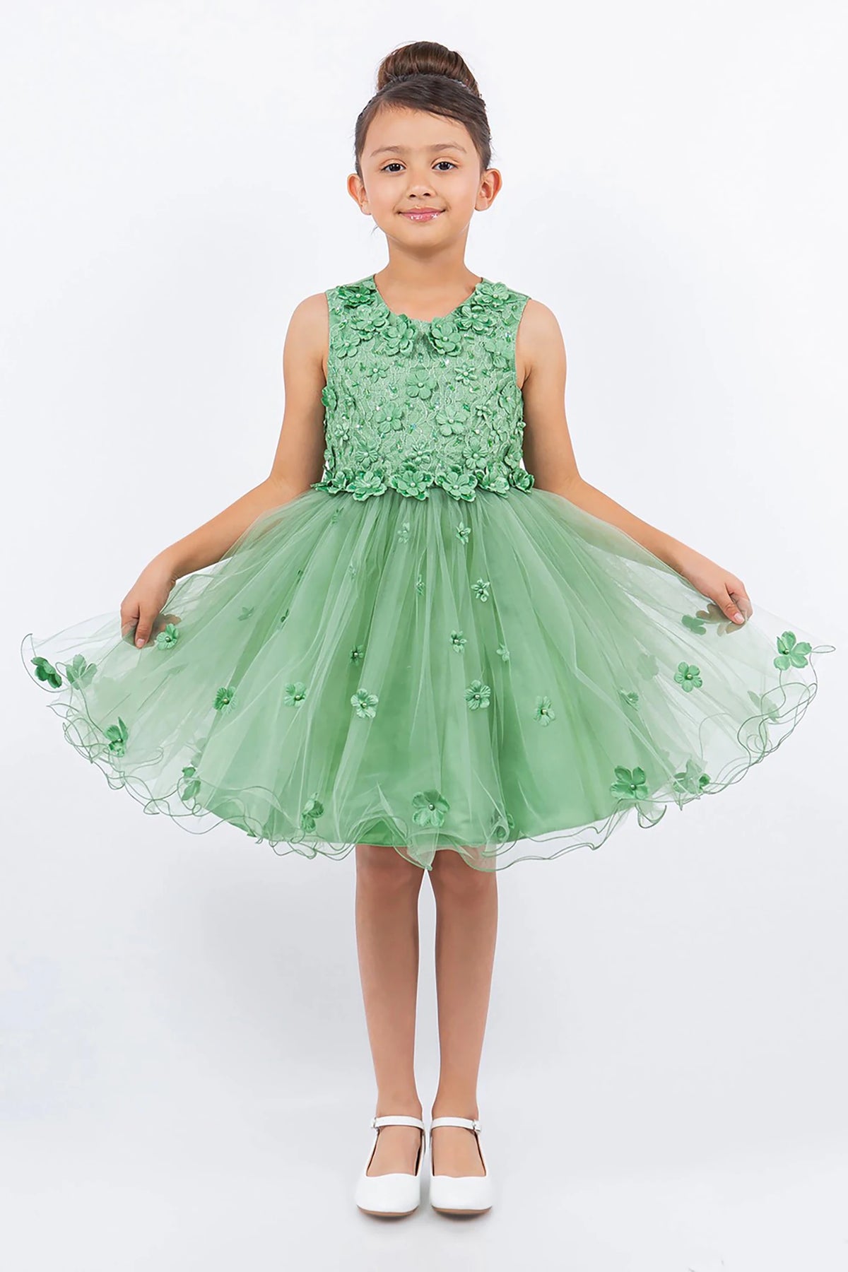 A sage floral flower girl dress.