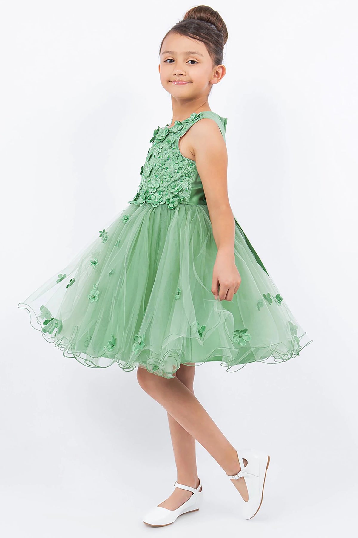 A sage flower girl dress with floral details.