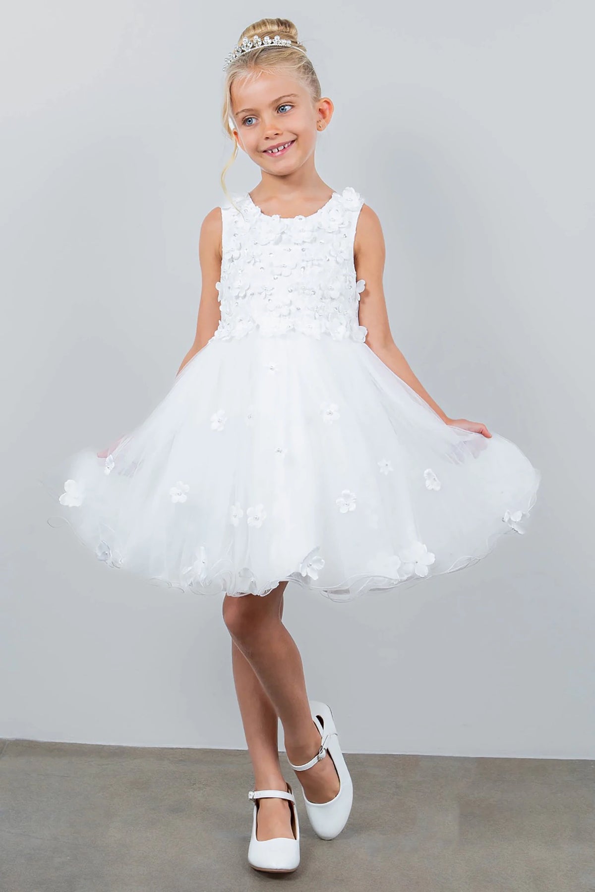 A white floral flower girl dress.
