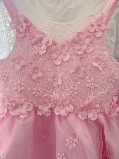 Blush High-Low Tulle Dress with Embedded 3D Floral Design | Flower Girl Dress - zoomed in front view of dress showcasing flower pattern with pearls