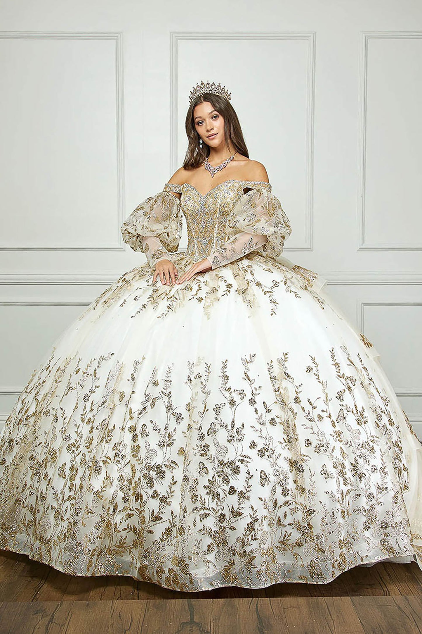 Ivory Gold Detachable Train With Stones and Gems See-through Bodice Quince Ball Gown front view with long sleeves