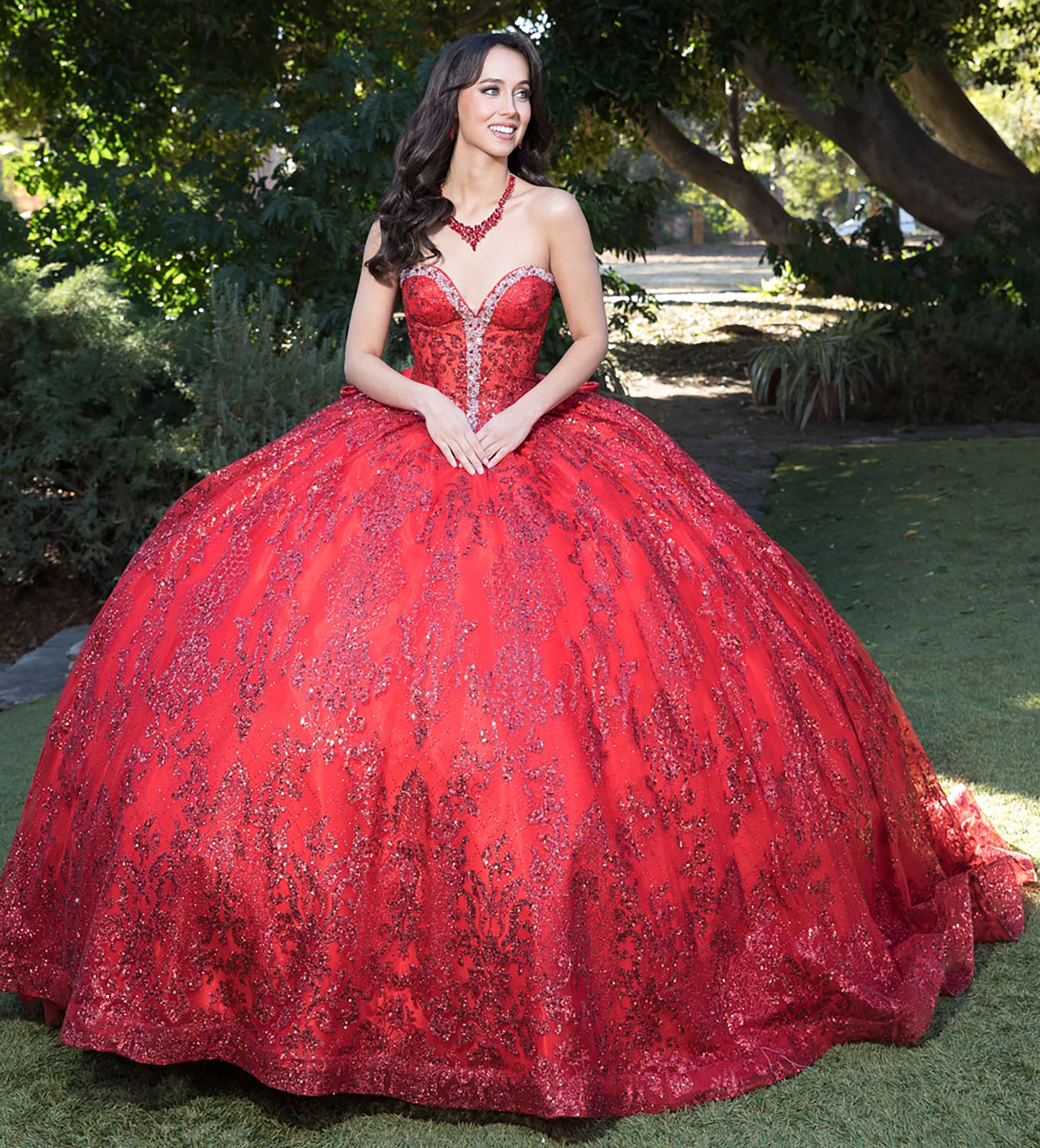 Red Sparkly Sequins and Embellishments See-through Corset Bodice adorned with Shimmering Gems Quince Ballgown front view