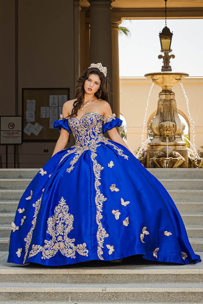 Royal Blue Gold Butterfly Accented Quince dress with Removable Pouf Arm Cuffs front view