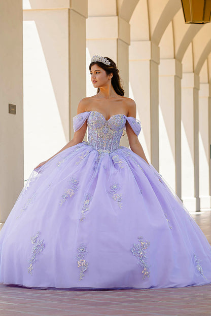 Quinceanera | Lilac Two-Tone See-Through Shimmering Sequins and 3D flowers Bodice Ballgown - front view of woman wearing dress looking of into the distance