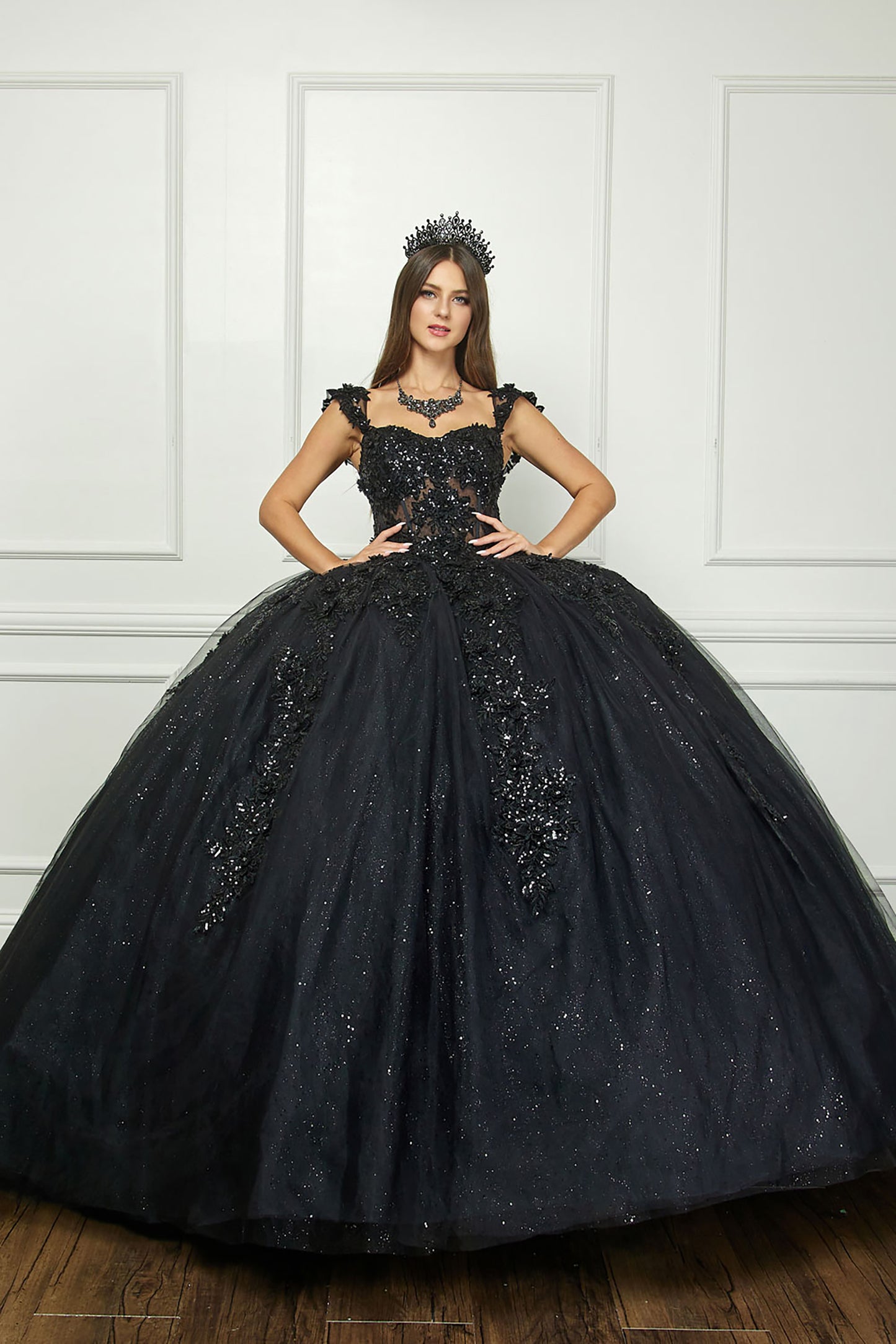 Black Detachable Sleeve Quince Ballgown - front view of woman wearing dress with both hands on hips