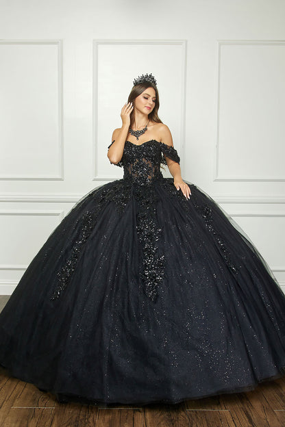 Black Detachable Sleeve Quince Ballgown - front view of woman wearing dress and touching her hair