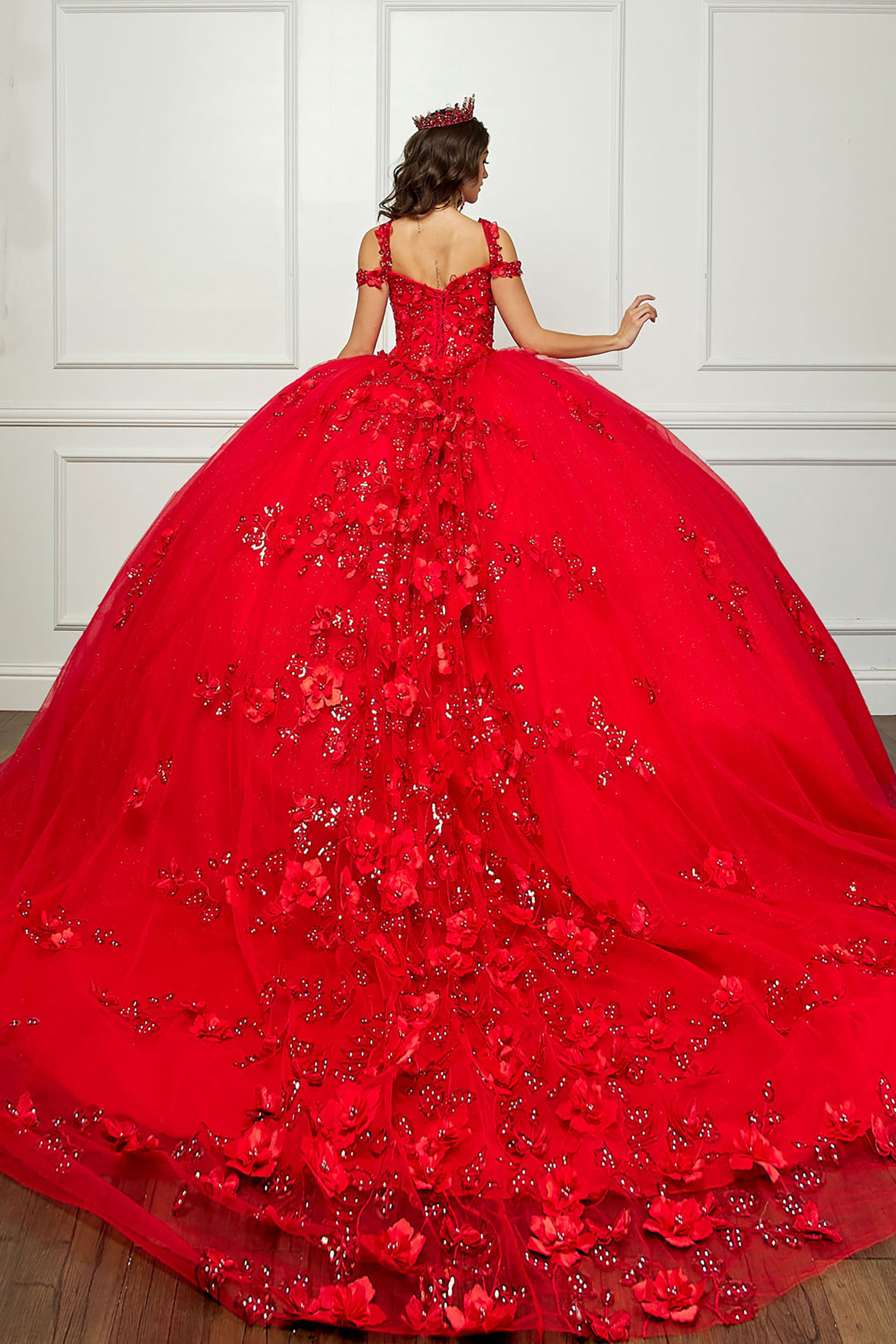 Red Long Train Off-Shoulder Sequin detail 3D Flower and Butterflies bodice with Sparkle Tulle Quince Dress - back view of woman wearing dress and red crown on her head