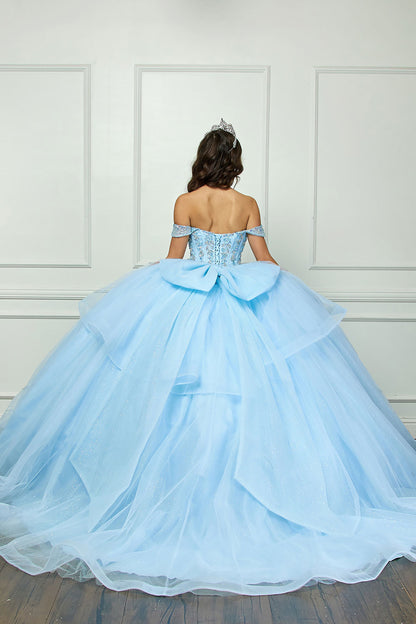 Quinceañera | Blue Glittering Tulle Layers, Off-shoulder Bodice adornments, and a detachable bow - back view of woman wearing dress