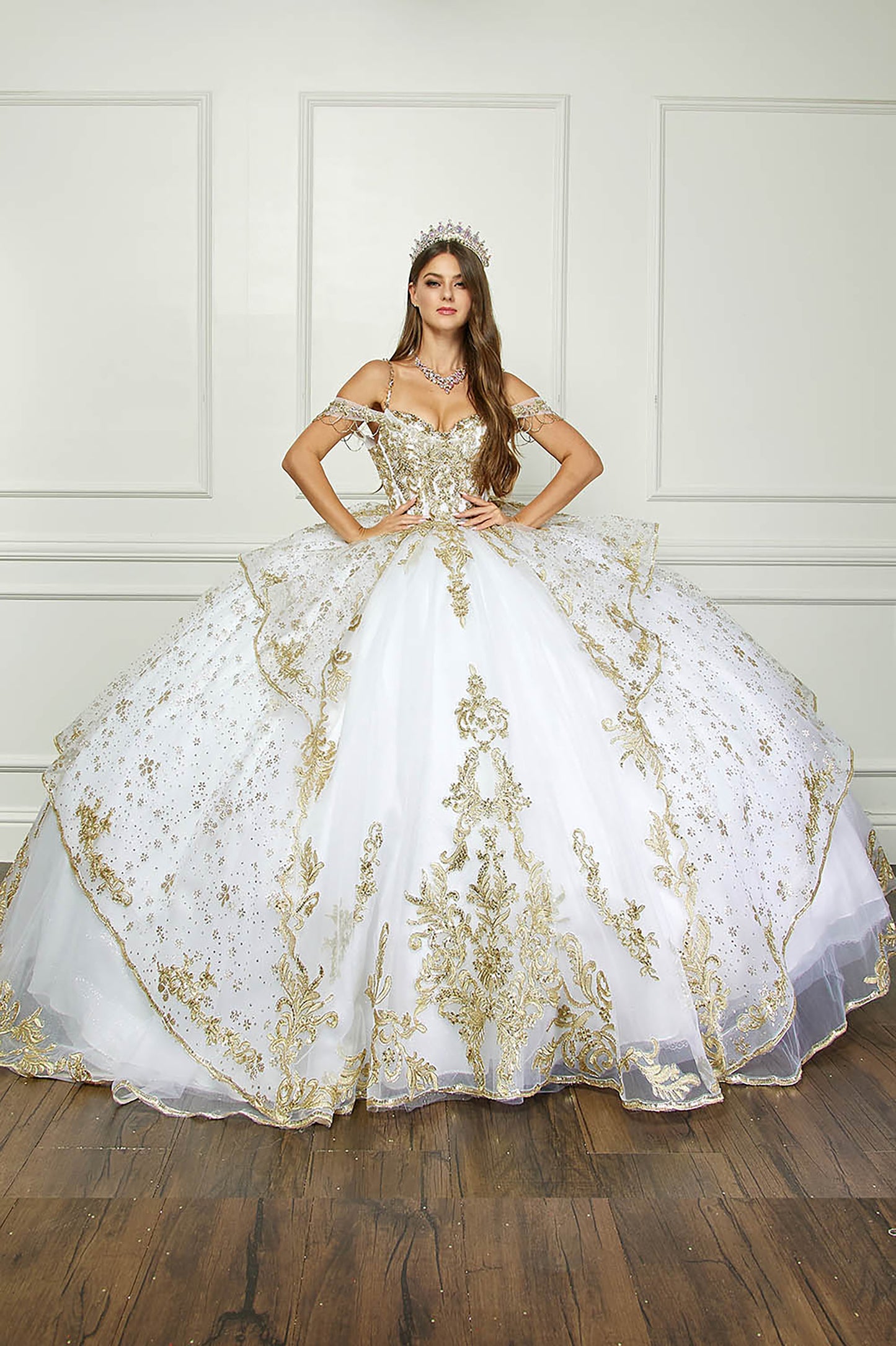 Ivory/Gold Off Shoulder Epaulets Sleeve with Detachable Cathedral Tulle Train Quince Ball Gown - front view of woman wearing dress with both hands on hips