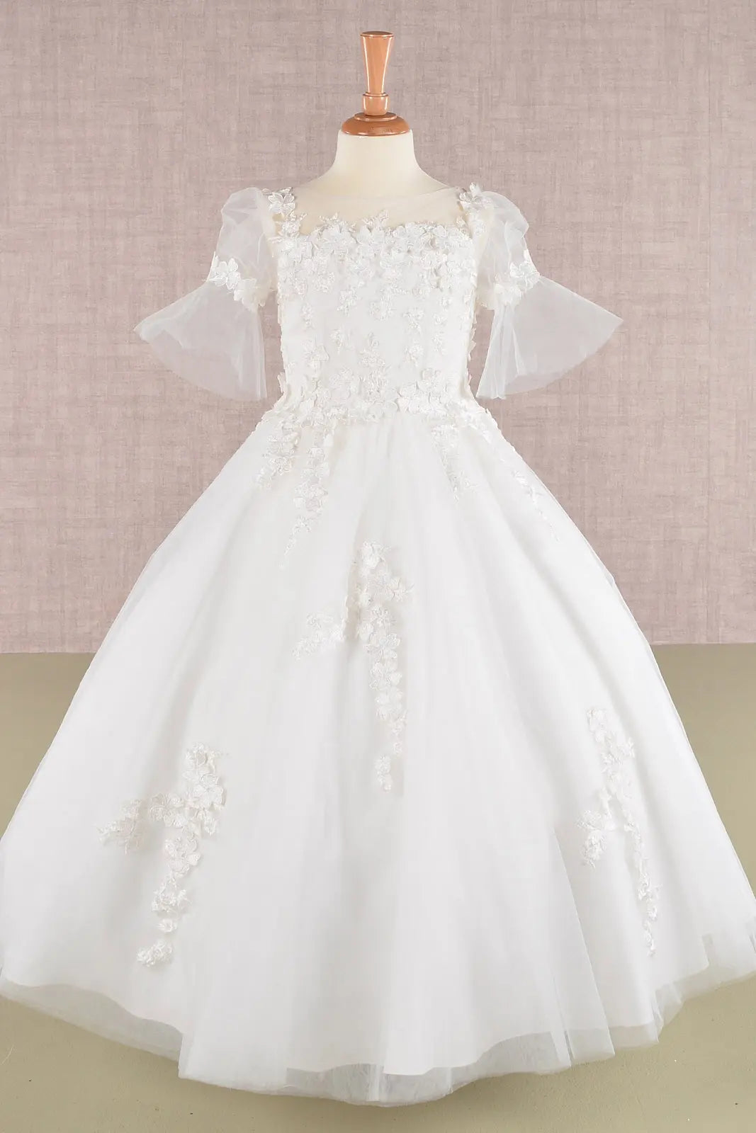 White floral dress on a mannequin against a light background back view