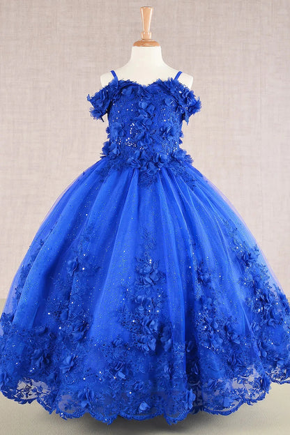 Young girl standing front-facing in royal blue kids mini quinceañera dress with 3D floral appliqué bodice and glitter embroidery mesh layered skirt