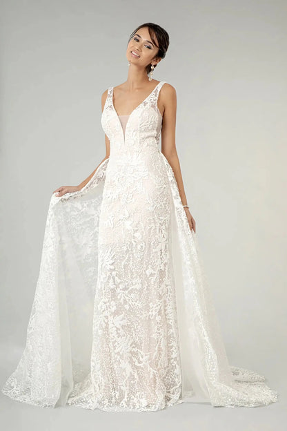 Front full-length view of an ivory glitter mermaid wedding dress featuring a shimmering illusion V-neckline, delicate straps, and a voluminous mesh overlay.