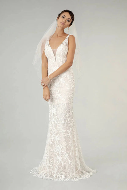 Front full-length view of an ivory glitter mermaid wedding dress with illusion V-neckline, sheer V-back, straps and mesh overlay.