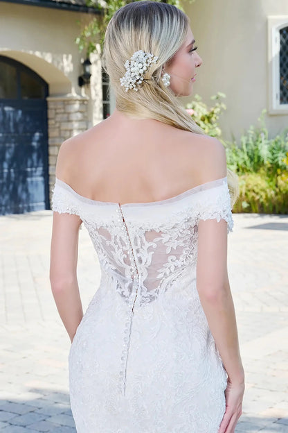Back close-up upper view focusing on the elegant sheer rear panel and the delicate row of classic button closures trailing down the center.