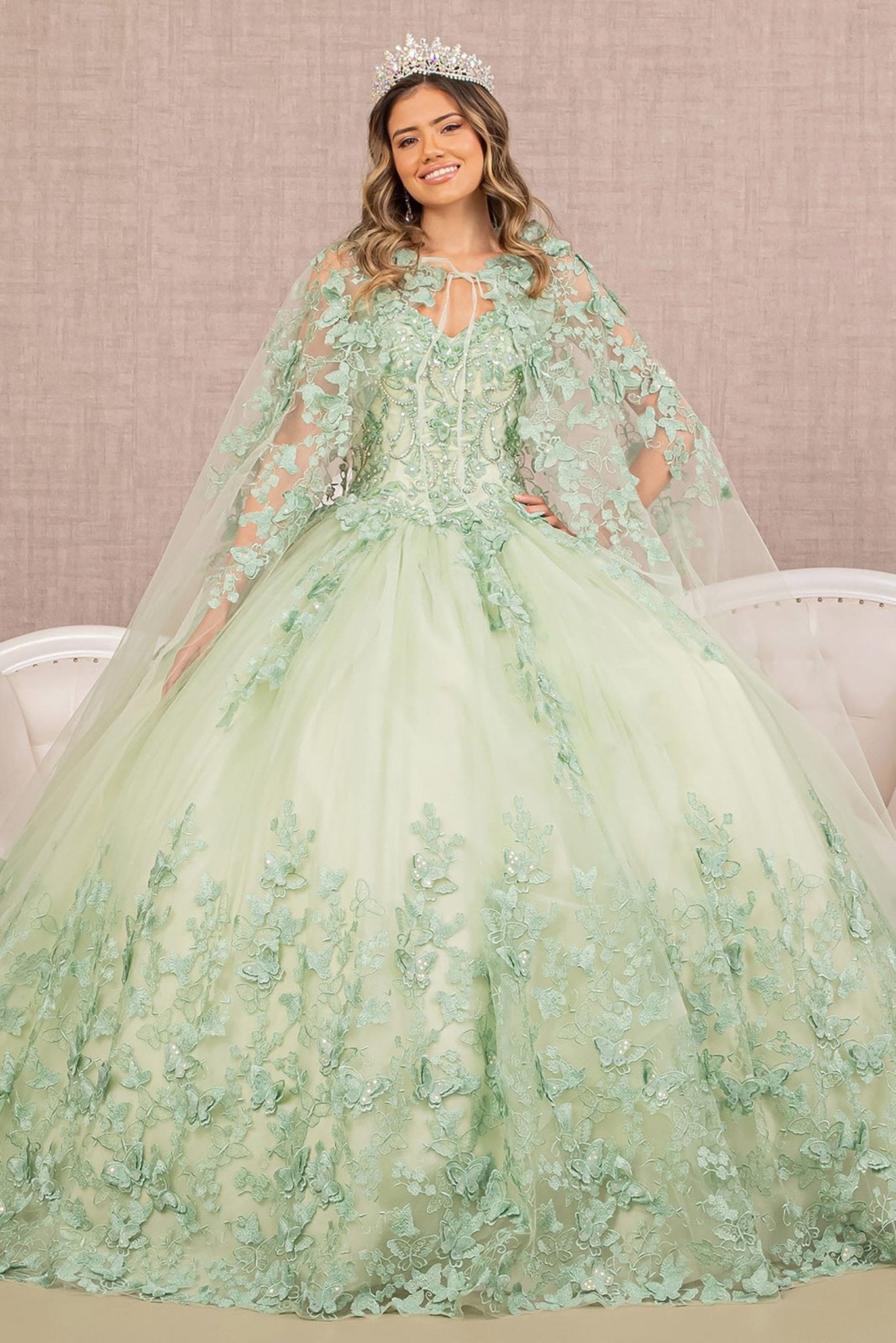 Front View of Sage Paloma Quince Dress with Jewel Mesh, 3D Butterfly Appliqués, and Long Mesh Cape
