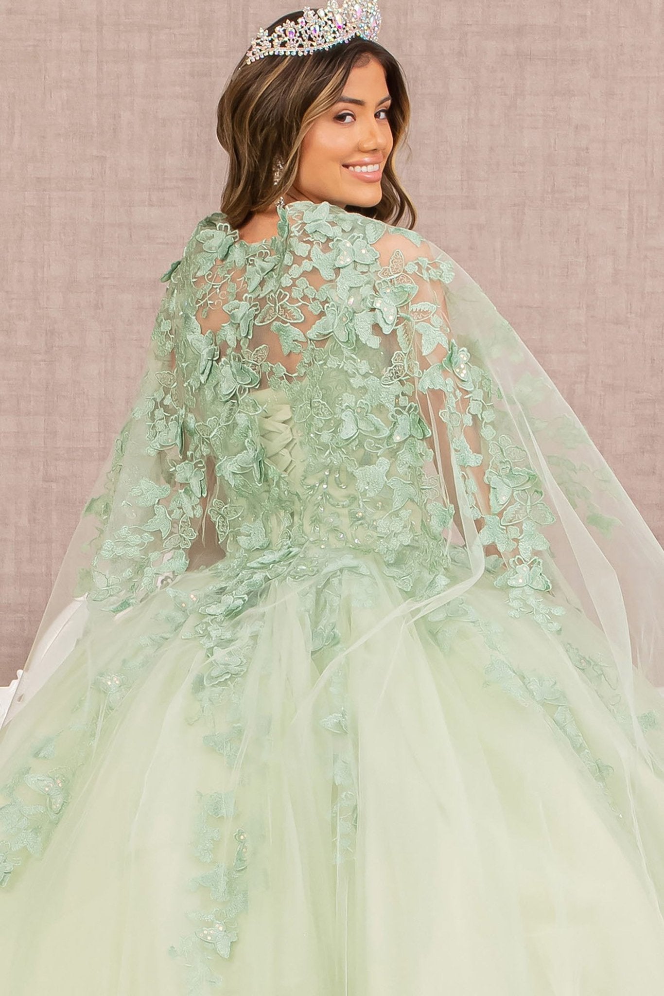 Side Close-Up of Sasge Paloma Quince Ball Gown with 3D Butterfly Appliqués and Mesh Cape