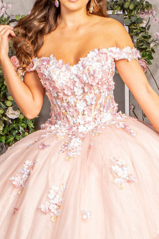 Pink floral off-shoulder dress with a soft focus background