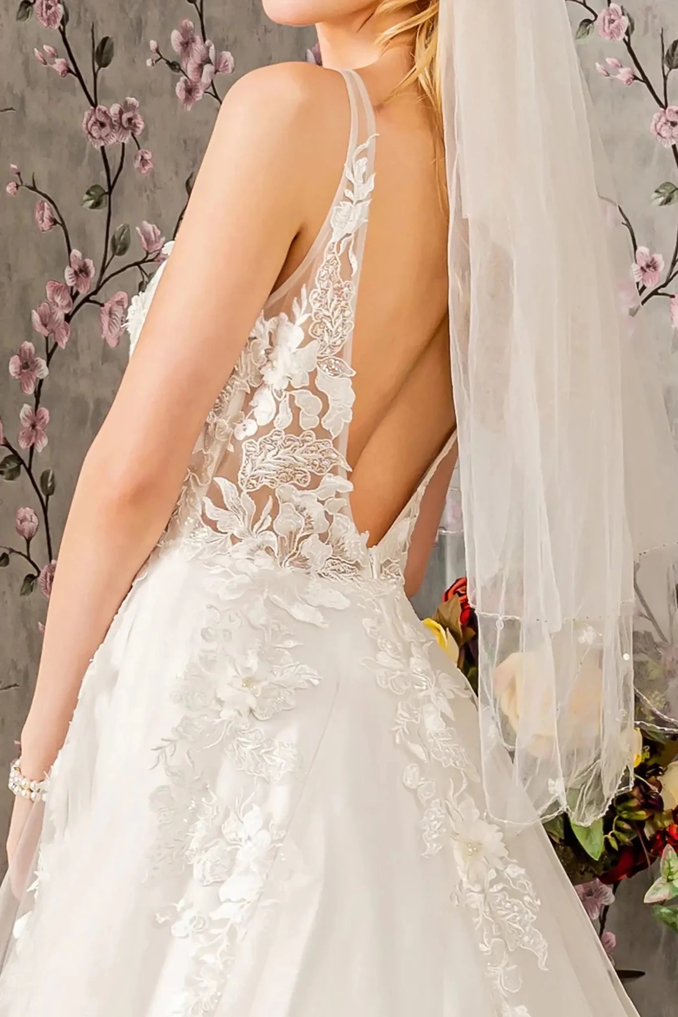 Back close-up upper view focusing on the elegant sheer V-back design and the clean, vertical line of the central zipper closure.