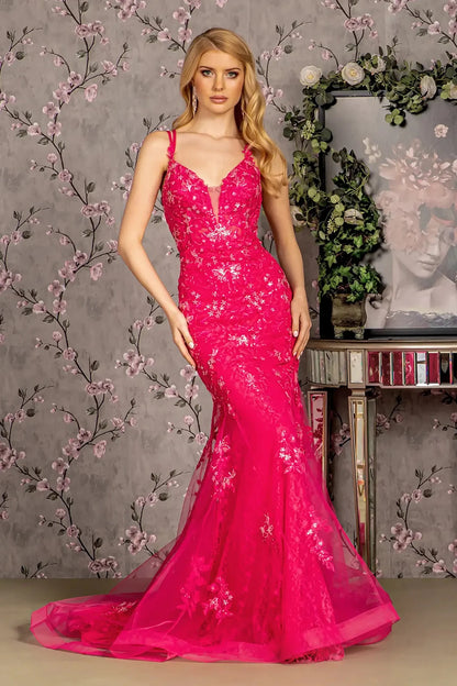 Front full-length view of a  Fuchsia mermaid prom dress with sheer bodice and floral sequin embroidery