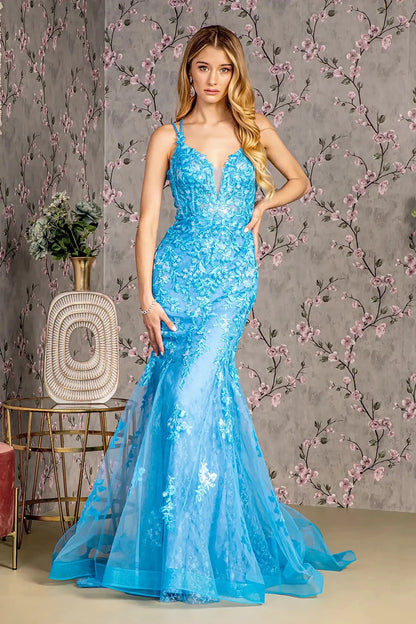 Front full-length view of a  Ocean blue mermaid prom dress with sheer bodice and floral sequin embroidery