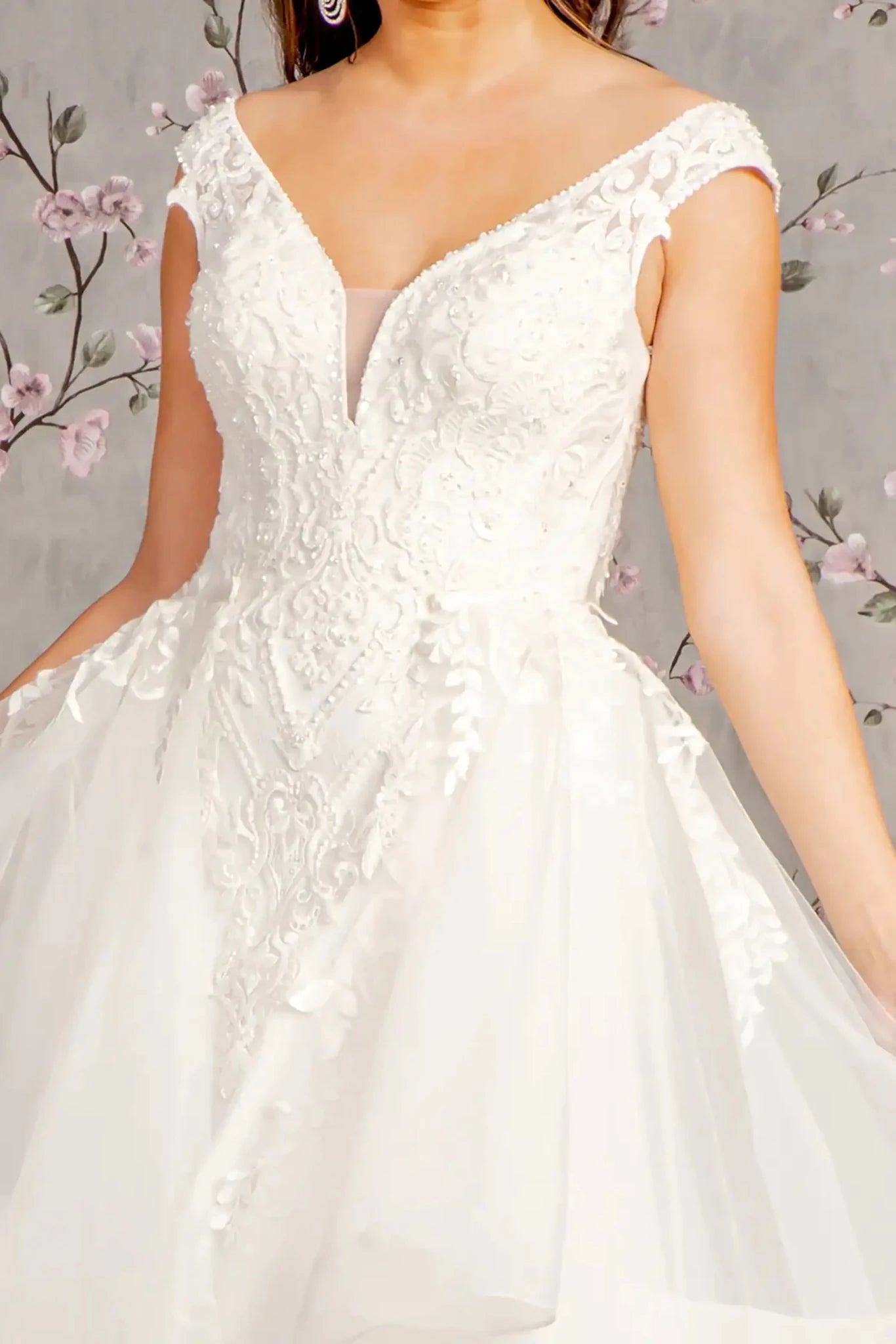 Front close-up upper view highlighting the dense beaded embroidery and shimmering sequins that cover the sheer bodice, creating a rich texture across the sweetheart curve.
