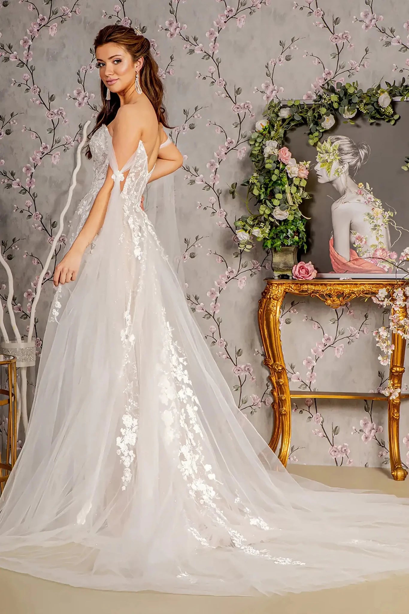 Back full-length view showcasing the sleek mermaid silhouette and the ethereal extension of the mesh cape as it drapes over the sequined train.