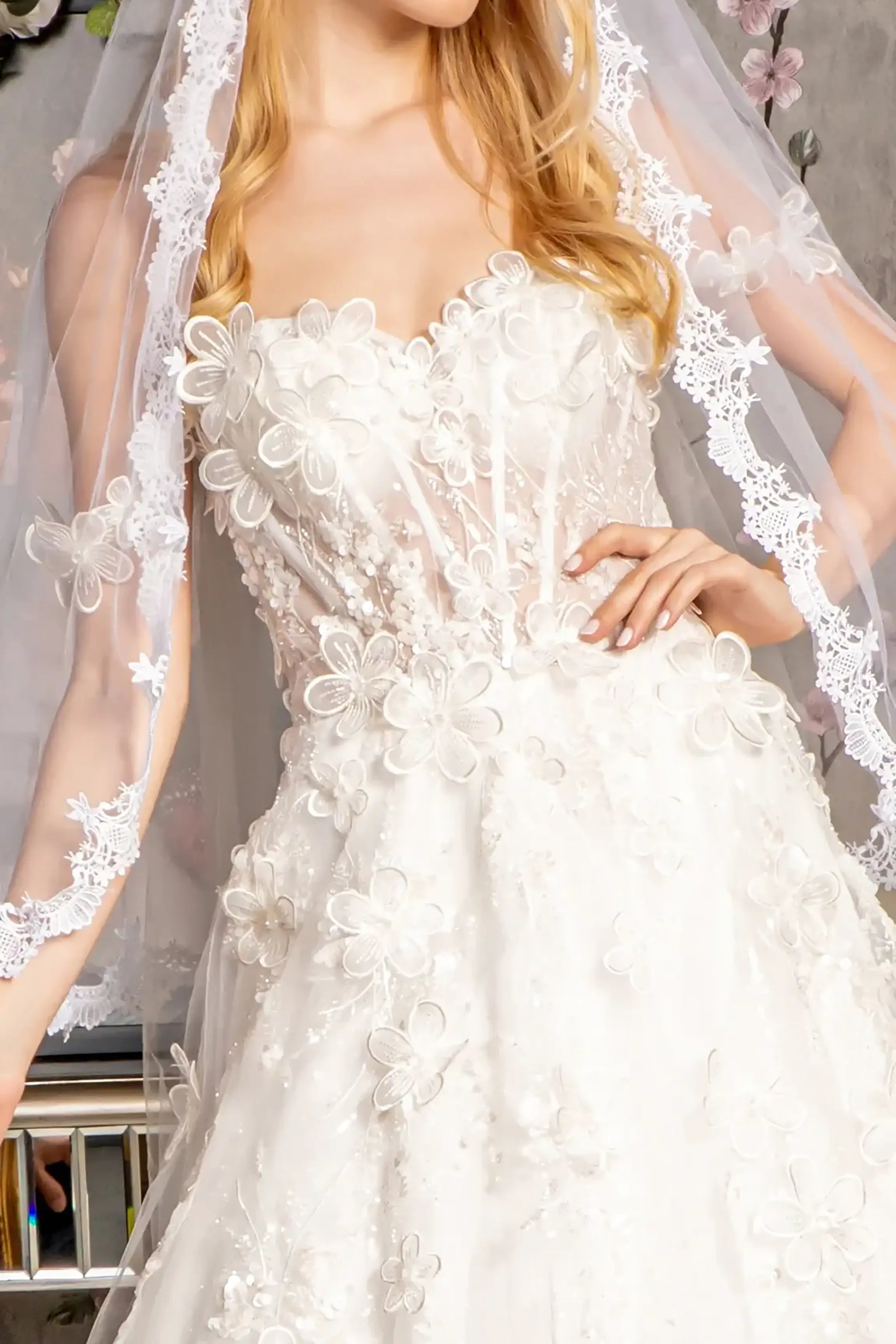 Front close-up upper view highlighting the sheer mesh bodice heavily embellished with intricate 3D floral embroidery, beads, and shimmering sequins.